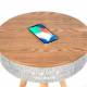 Sinox Bluetooth speaker and dark wood table